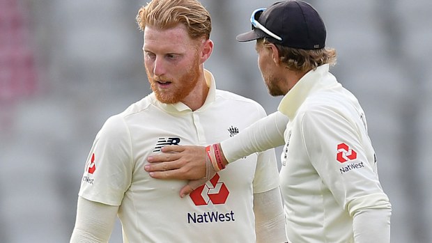 Joe Root of England congratulates Ben Stokes