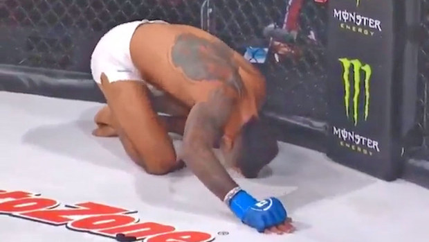 Bellator Kickboxing champion Raymond Daniels lands low blow on Peter Stanonik.