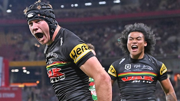 Brian To'o of the Panthers celebrates with Matt Burton of the Panthers