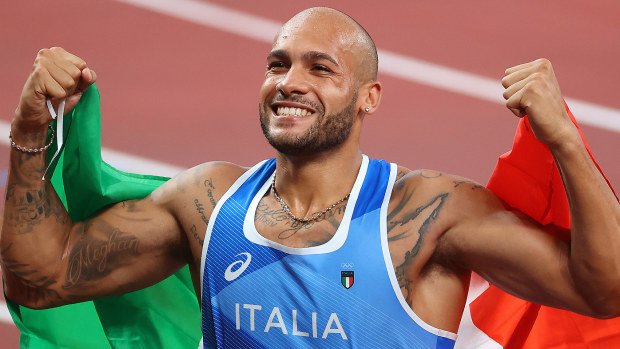 Lamont Marcell Jacobs of Team Italy celebrates after winning gold in the Men's 100m Final