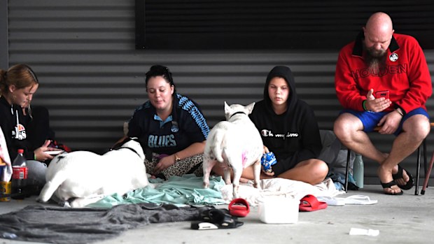 People take shelter at an evacuation centre in Ipswich. Parts of South-East Queensland are experiencing the worst flooding in over a decade.