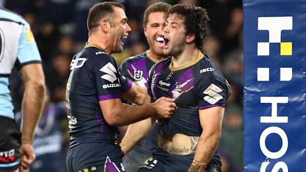 Melbourne Storm celebrate victory over the Sharks