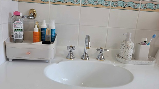 Bathroom vanity with storage unit that has to stay on the counter