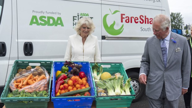 Prince Charles, Prince of Wales who is President of Business In The Community, and Camilla, Duchess of Cornwall visit an Asda distribution centre to thank staff who have kept the country's vital food supplies moving throughout the coronavirus pandemic on July 9, 2020 in Avonmouth, England