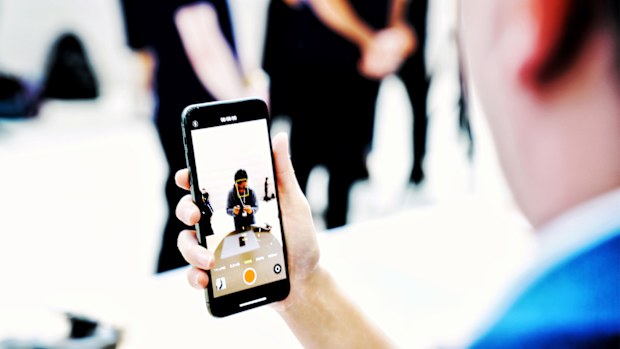 Hands-on with the new iPhone. Picture: Trevor Long