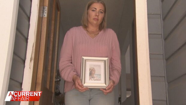 Kylie Thornton with a picture of her late daughter, Caitlin Thornton.