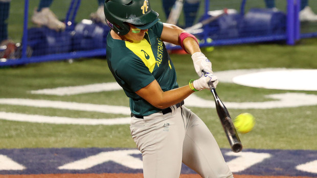 Jade Wall of Team Australia hits a home run in the sixth inning against Team Mexico during softball opening round on day three of the Tokyo Olympic Games.