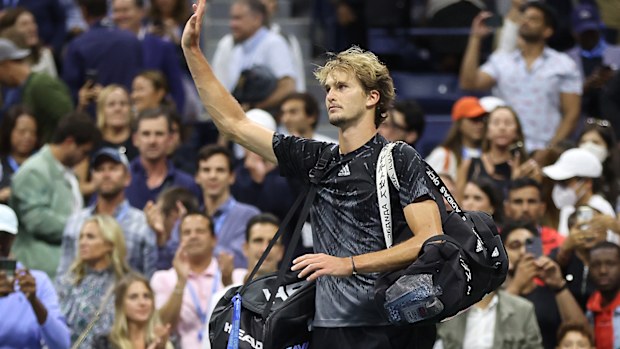 Alexander Zverev of Germany waves after being defeated by Novak Djokovic 