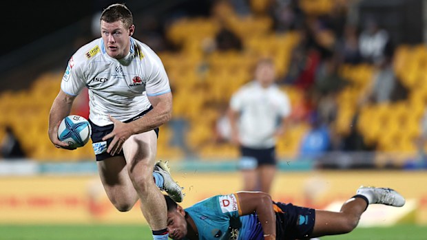 Tom Horton of the Waratahs makes a break