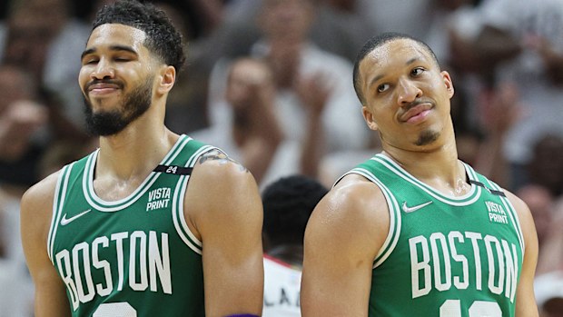 Jayson Tatum #0 and Grant Williams #12 of the Boston Celtics have a moment during the win.