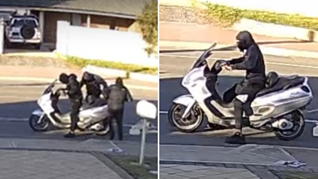 The escape vehicle was a black and white scooter.