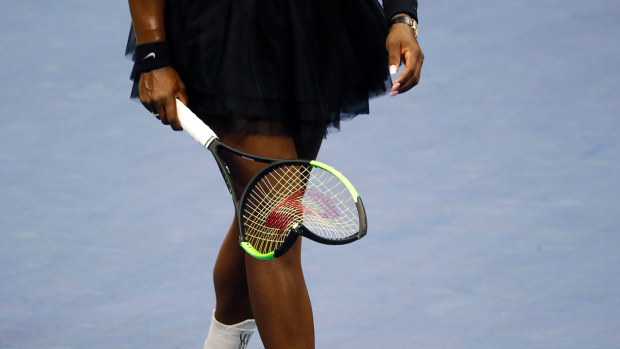 Williams' smashed racquet