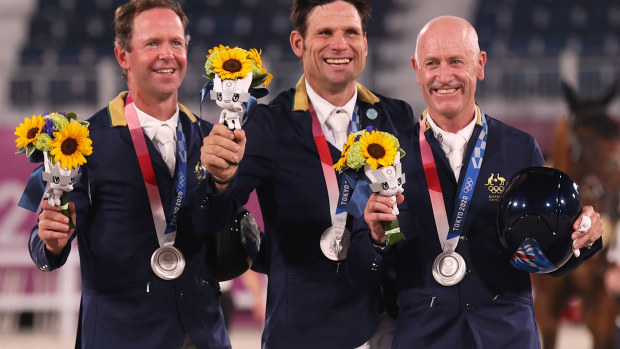Silver medallists Kevin McNab, Shane Rose and Andrew Hoy of Team Australia pose with their silver medals during the Eventing Jumping Team medal ceremony at the Tokyo Olympics.