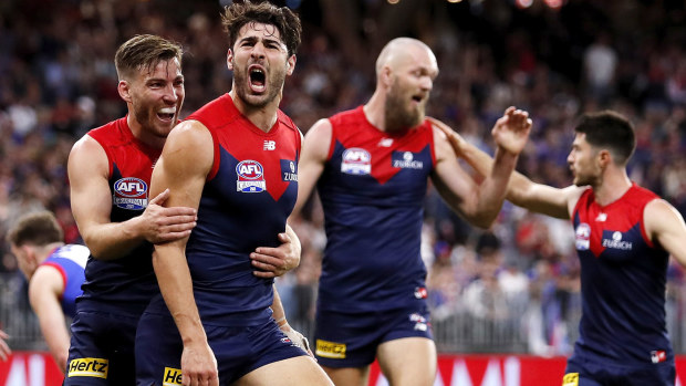 Christian Petracca of the Demons celebrates a goal with Jack Viney of the Demons during the 2021 Toyota AFL Grand Final match between the Melbourne Demons and the Western Bulldogs at Optus Stadium on September 25, 2021 in Perth, Australia. (Photo by Dylan Burns/AFL Photos via Getty Images)