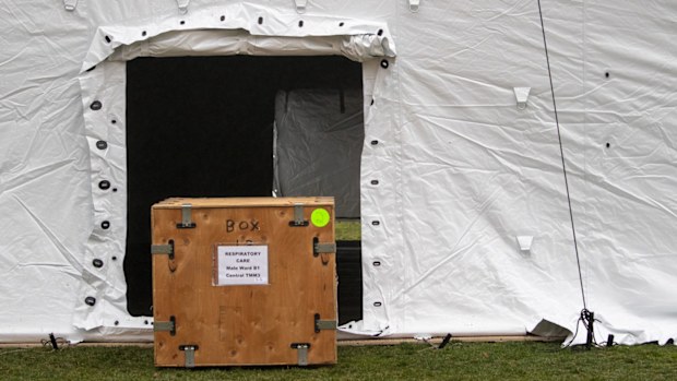 A Samaritan's Purse crew works on building an emergency field hospital equipped with a respiratory unit in New York's Central Park across from the Mount Sinai Hospital. 