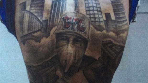 Adam Dowidar's Brothers for Life back tattoo. (AAP)