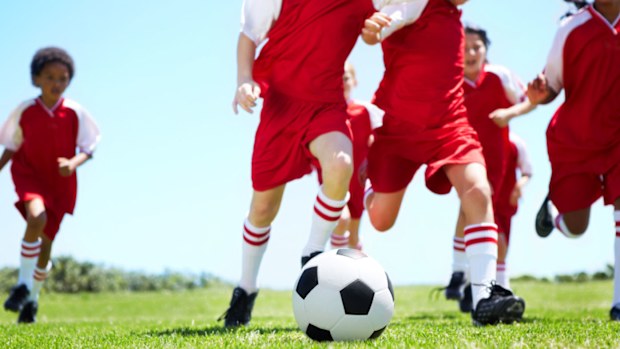Children playing soccer