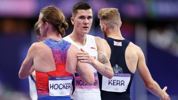 Jakob Ingebrigtsen congratulates Cole Hocker on winning Olympic gold.