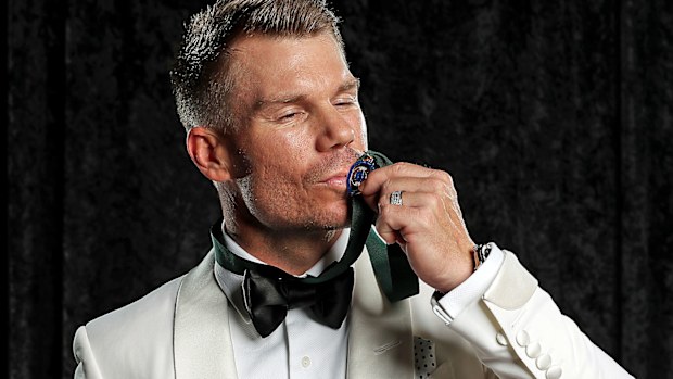 David Warner poses with the Allan Border Medal
