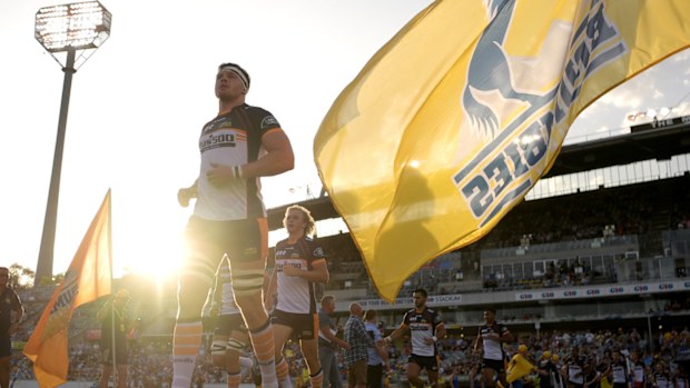 The Brumbies run out before the round one Super Rugby match between the Brumbies and the Reds at GIO Stadium 