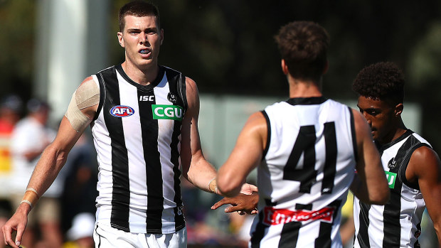  Mason Cox of the Magpies celebrates during the 2020 AFL Marsh Community Series