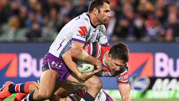 Cameron Smith tackles Victor Radley