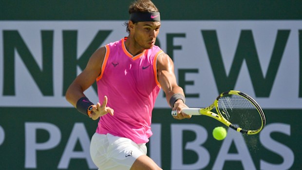 Rafael Nadal, of Spain, hits a forehand to Karen Khachanov, of Russia, at the 2019 BNP Paribas Open tennis tournament in Indian Wells
