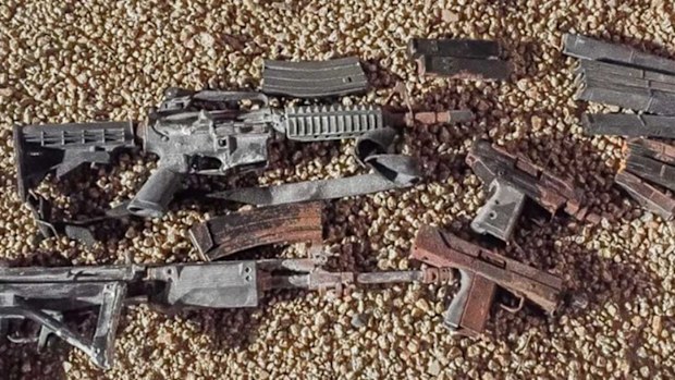 Phoenix Police are now trying to find out who buried this bag of guns in a backyard.