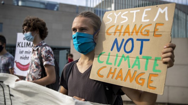Climate activists demonstrate in front of the German Chancellery on August 20, 2020 in Berlin, Germany