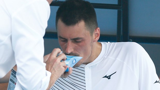 Bernard Tomic struggles with respiratory issues in Melbourne