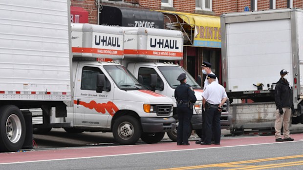 Trucks outside the Andrew T. Cleckley Funeral Home