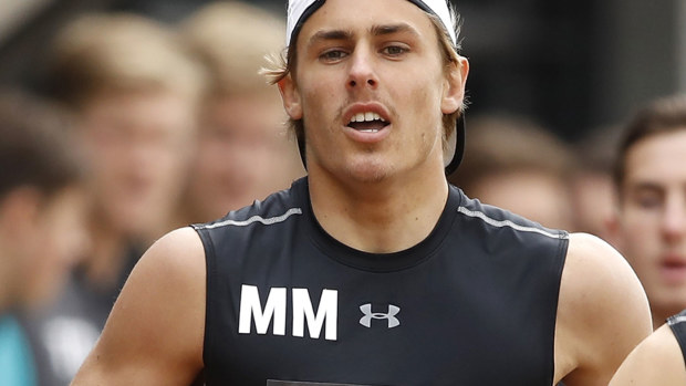 Jeremy Sharp (54) completes the 2km time trial during the 2019 AFL Draft Combine 