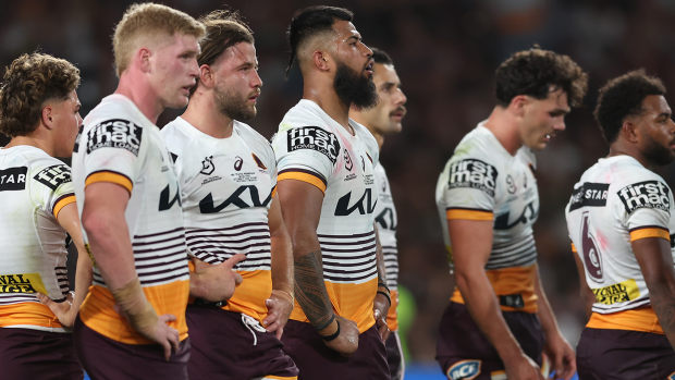 Broncos players react after a Panthers try during the 2023 NRL grand final.