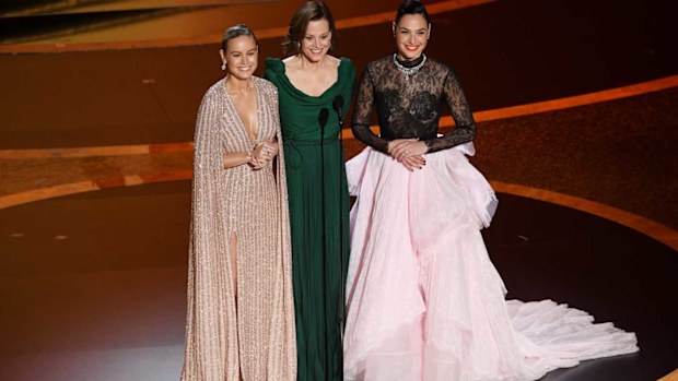 Brie Larson, Sigourney Weaver, and Gal Gadot speak onstage during the 92nd Annual Academy Awards at Dolby Theatre on February 09, 2020.