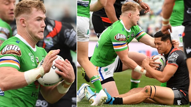 Hudson Young of the Raiders tackles during the round 25 