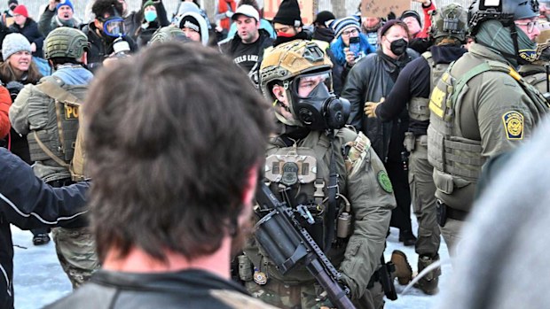 Heavily armed ICE agents face off with protesters in Minnesota.