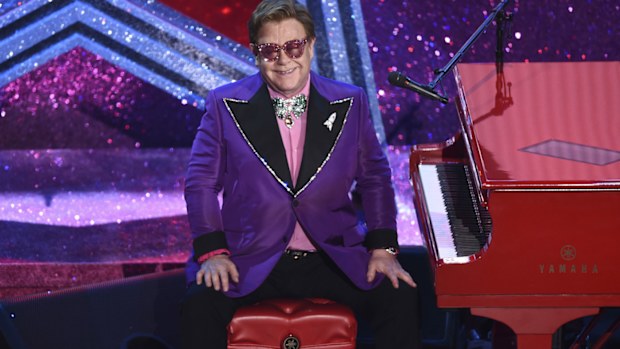 In this Sunday, Feb. 9, 2020, file photo, Elton John appears after performing his nominated song, "(I'm Gonna) Love Me Again," at the Oscars in Los Angeles. 