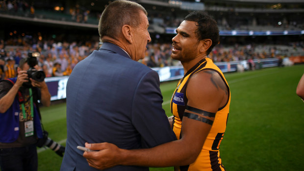 Cyril Rioli pictured with Hawthorn president Jeff Kennett during his final season in 2018