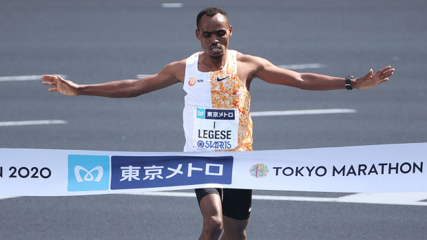  Birhanu Legese #1 of Ethiopia celebrates as he crosses the finish line to win the mens competition during the Tokyo Marathon