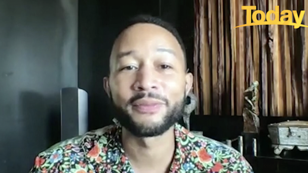 The singer told Brooke Boney it's been hard being an American under Donald Trump.
