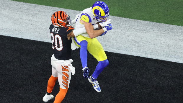  Cooper Kupp #10 of the Los Angeles Rams makes a touchdown catch over Eli Apple #20 of the Cincinnati Bengals during Super Bowl LVI