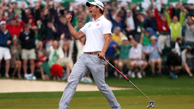 Adam Scott celebrates his birdie at the 18th hole during the final round of the 2013 Masters.