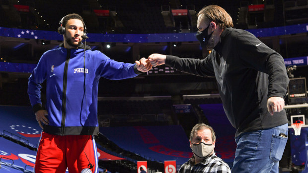 Ben Simmons and President of Basketball Operations Daryl Morey embrace during a February 2021 game