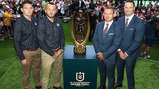 Jarrod Croker and Josh Hodgson of the Raiders & Jake Friend and Boyd Cordner of the Roosters pose with the Provan-Summons Trophy