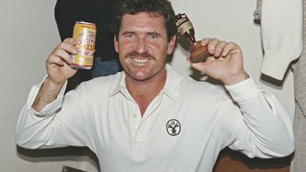 Australian captain Allan Border celebrates with the Ashes urn in 1989.