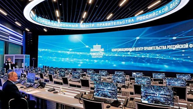 Russian President Vladimir Putin visits the Coordination Center of the Russian Government in Moscow.