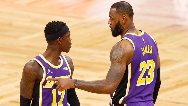 JANUARY 30: LeBron James #23 of the Los Angeles Lakers talks with Dennis Schroder #17 during the fourth quarter against the Boston Celtics at TD Garden on January 30, 2021 in Boston, Massachusetts. The Lakers defeat the Celtics 96-95. (Photo by Maddie Meyer/Getty Images)