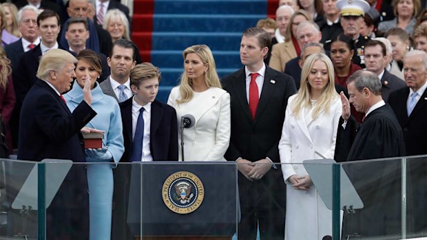 Donald Trump taking the oath of office surrounded by his family in 2017.