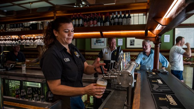 Jennifer Rounds pouring last drinks at Fortune of War, Sydney's oldest pub prior to closing its doors on March 23.