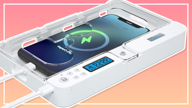 9PR: Phone safe lockbox on peach pink background with white border
